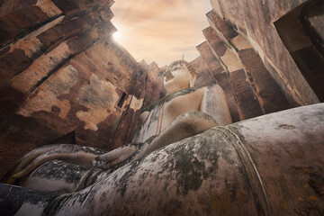 Perspective giant buddha sculpture in stupa of wat sri chum historical of sukhothai