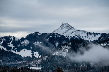 Fototapeta na wymiar Snow covered mountains. Tranquil scene in winter. Les Pleiades, Switzerland.