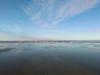 Beautiful sea with seagulls. View of the coast of the English Channel in France in the city of Deauville.