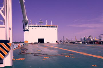 Fototapeta premium big yellow roro vessel inside a dry dock for repair