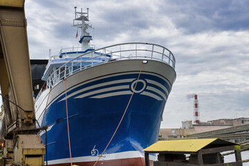big oceanic fishing boat in a harbour