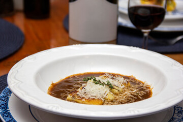 Gnocchi stuffed with ossobuco, ossobuco broth and grana padano cheese
