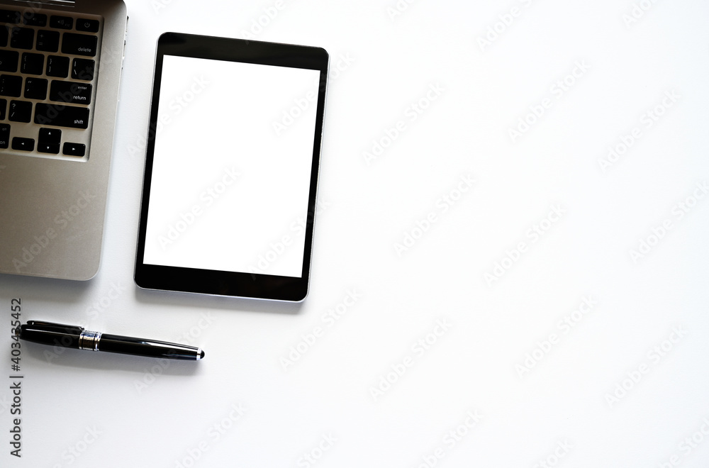 Poster top view tablet,smartphone ,mouse and keyboard on office desk.top view with copy space.