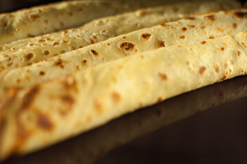 Slapjack, pancakes, rolled and laid the slide on the plate