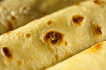 Slapjack, pancakes, rolled and laid the slide on the plate