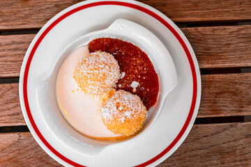 The famous, traditional Hungarian dessert called: túrógombóc (cottage cheese balls).