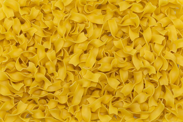 Dried pasta noodles as background