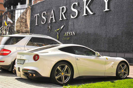 Kiev, Ukraine - May 3, 2019: White Ferrari F12 Berlinetta in the city
