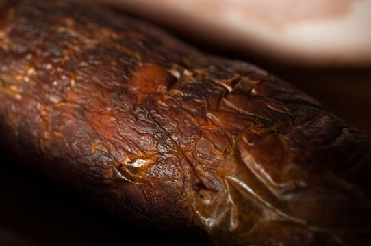 Detail of a cured and smoked sausage