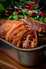 Baked bacon roulade and roasted pork neck.