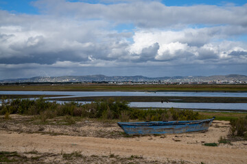 view of the Ria Formosa Natural Park and town of Faro in Portugal
