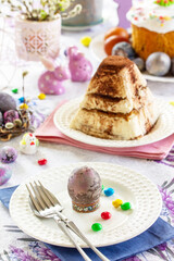 Table setting. Easter table with Easter eggs and easter orthodox sweet bread.