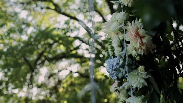 wedding arch of flowers close-up in the park