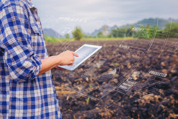 Smart farm, farmer owner using smart tablet to analysis and control soil plant quality. future...