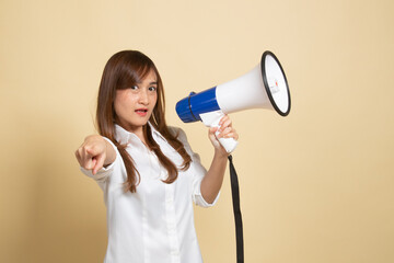 Beautiful young Asian woman announce with megaphone.