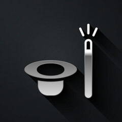 Silver Magic hat and wand icon isolated on black background. Magic trick. Mystery entertainment concept. Long shadow style. Vector.