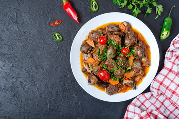 Roast offal with vegetables. Armenian dish Kuchmachi. The top view