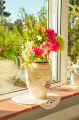 Pretty flowers on a windowsill