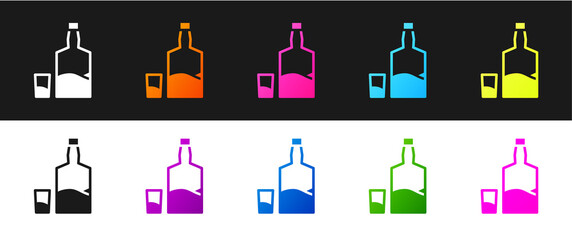 Set Tequila bottle and shot glass icon isolated on black and white background. Mexican alcohol drink. Vector.