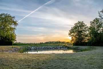 Pond in sunset