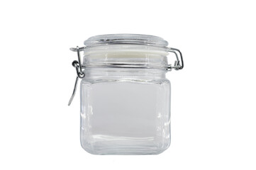Empty glass jar with clip-on lid isolated on light gray background.