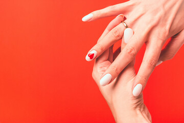 Girl demonstrates a wedding or engagement ring on her finger. Greeting card with place for text or invitation.