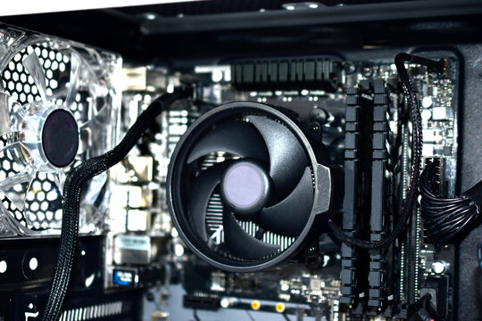 Black fans on the motherboard in the PC and processor