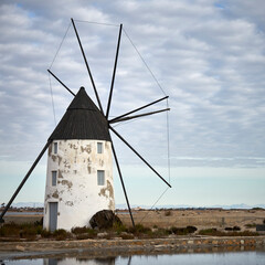 Historic windmill in the salt lakes in San Pedro del Pinatar, Murcia, Spain. Spanish name: Molino de Quint&iacute;n.