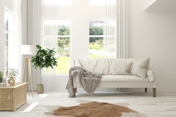 White living room with sofa and summer landscape in window. Scandinavian interior design. 3D illustration