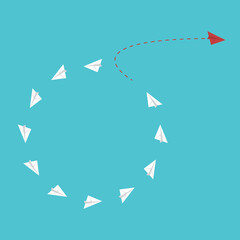 Think differently. Red airplane changing direction. New idea, change, trend, courage, creative solution, innovation and unique way concept.	