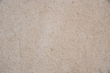 Vintage grunge texture of old weathered dirty wall. Painted cracked walls, textured in cracks and drips of paint. Unique scenic unusual background. Cement wall with stain marks. A texture of an old