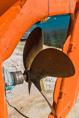 Rusty propeller from an old fishing boat in Greece