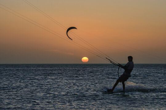 Silhouette of a kitesurfer - Sunset Kitesurfing in Cabo de la Vela, Guajira, Colombia