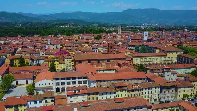 The skyline iof the picturesque old Italian town of Lucca known for the large medieval walls that still surround the town today