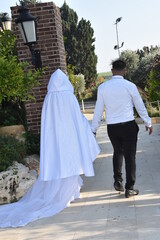 bride and groom walking