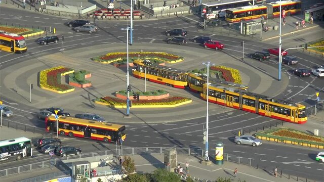 City traffic at busy intersection in downtown Warsaw, Poland.