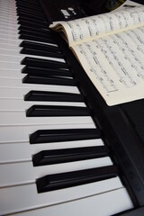Electric piano, keyboard piano, pianino klawisze instrumentu i nuty
