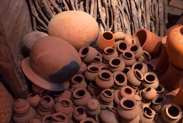 Traditional pottery ,Clay pots of various sizes and heaps,Showcase of handmade ceramic pottery