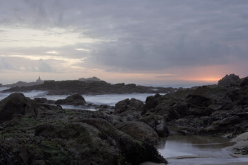 Fototapeta na wymiar Rocky beach at sunset