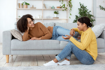 Fototapeta premium Chatter, gossip and friendship at home during free time and covid-19 lockdown
