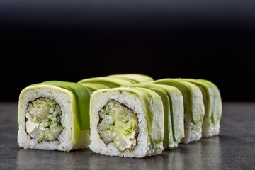 Set green sushi roll with avocado