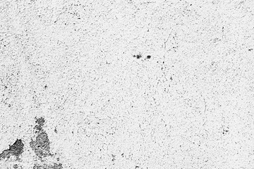 Texture of a concrete wall with cracks and scratches which can be used as a background