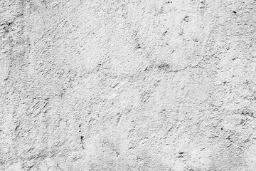 Texture of a concrete wall with cracks and scratches which can be used as a background