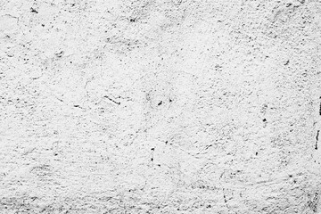 Texture of a concrete wall with cracks and scratches which can be used as a background