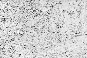 Texture of a concrete wall with cracks and scratches which can be used as a background