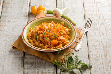 lentils pasta with yellow tomatoes and sage