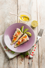 fish fillet with shrimp pink pepper carrots and lime