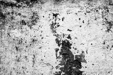 Texture of a concrete wall with cracks and scratches which can be used as a background