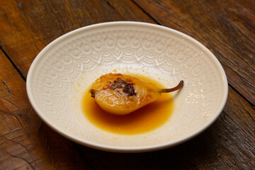 Dessert Pear Brulee stuffed with Gorgonzola cheese