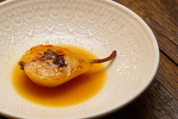 Dessert Pear Brulee stuffed with Gorgonzola cheese